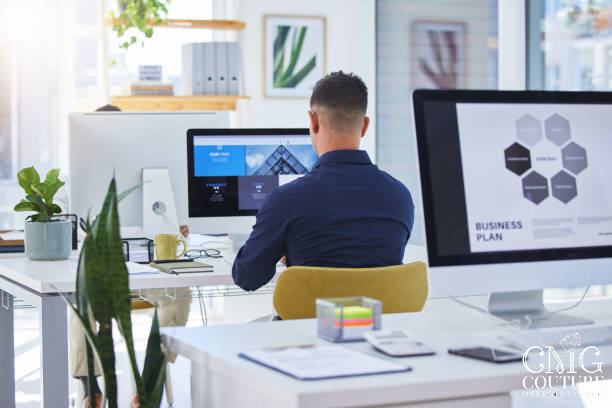 Business professional reviewing a clean, well-structured website layout